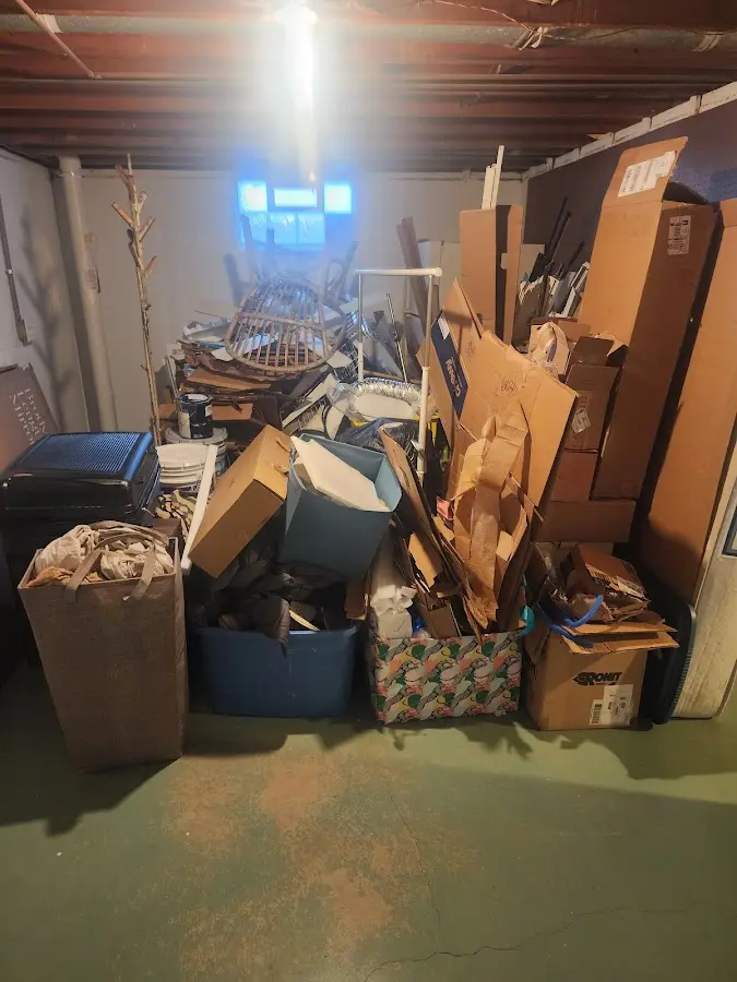 Roll-off dumpster container at job site for 2 Yard Dumpster Rental in Springdale